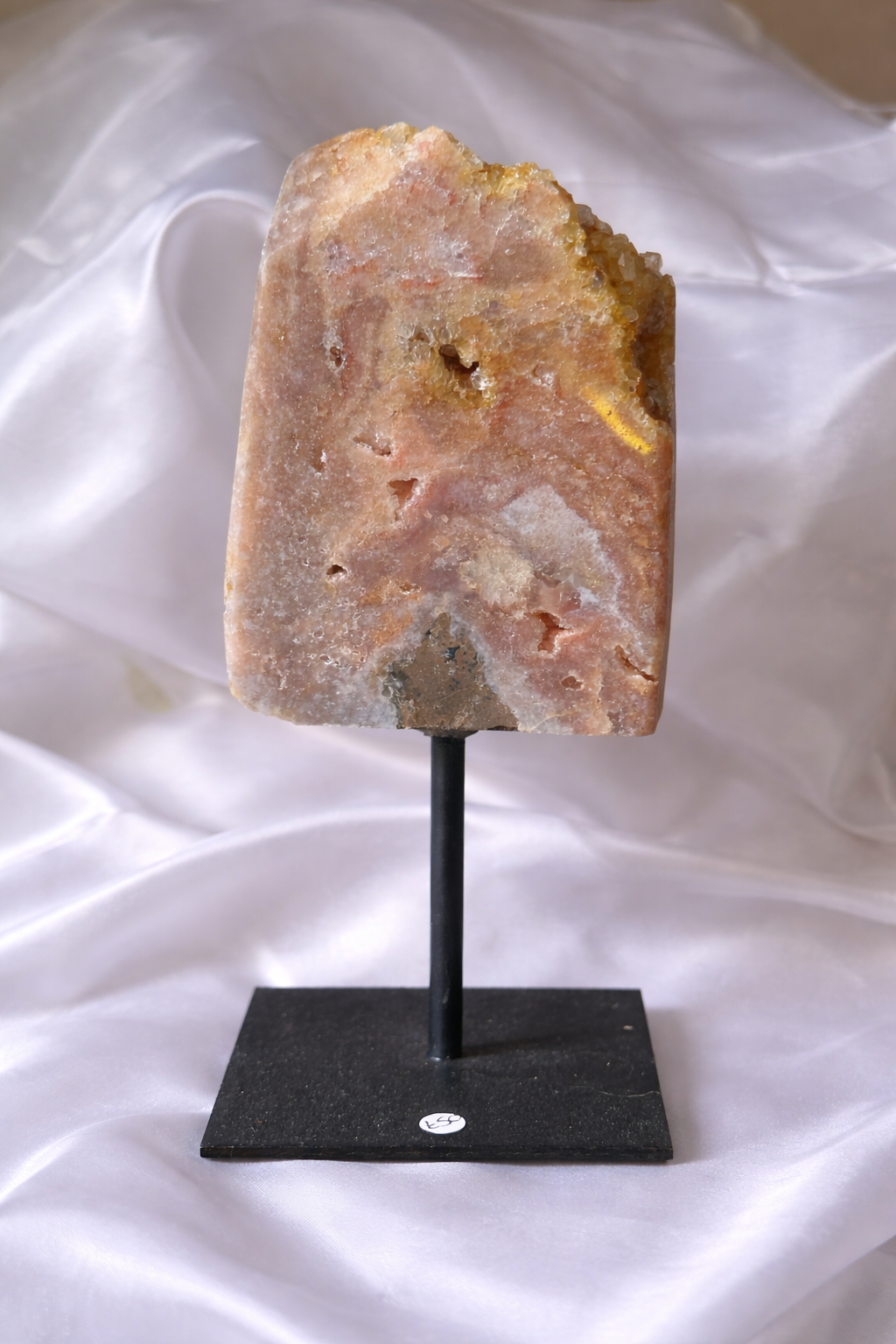 Pink amethyst on a stand