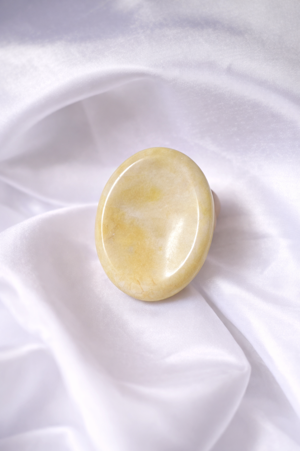 Orange calcite worry stone