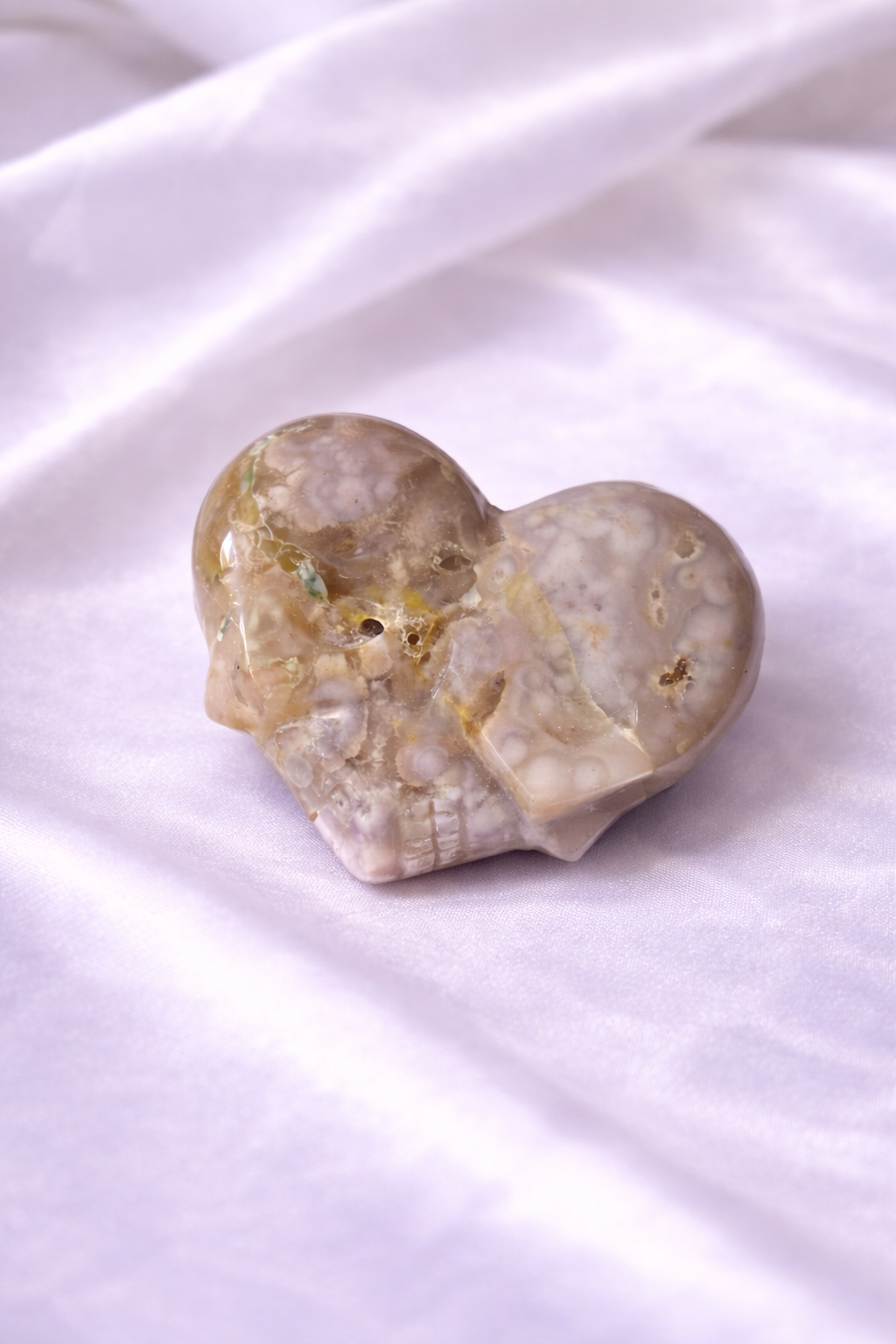 Flower agate heart made of skulls